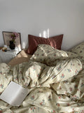 Cottagecore-inspired floral bedding set. Includes 100% cotton duvet cover, flat sheet, and pillowcases for cozy shabby chic decor.