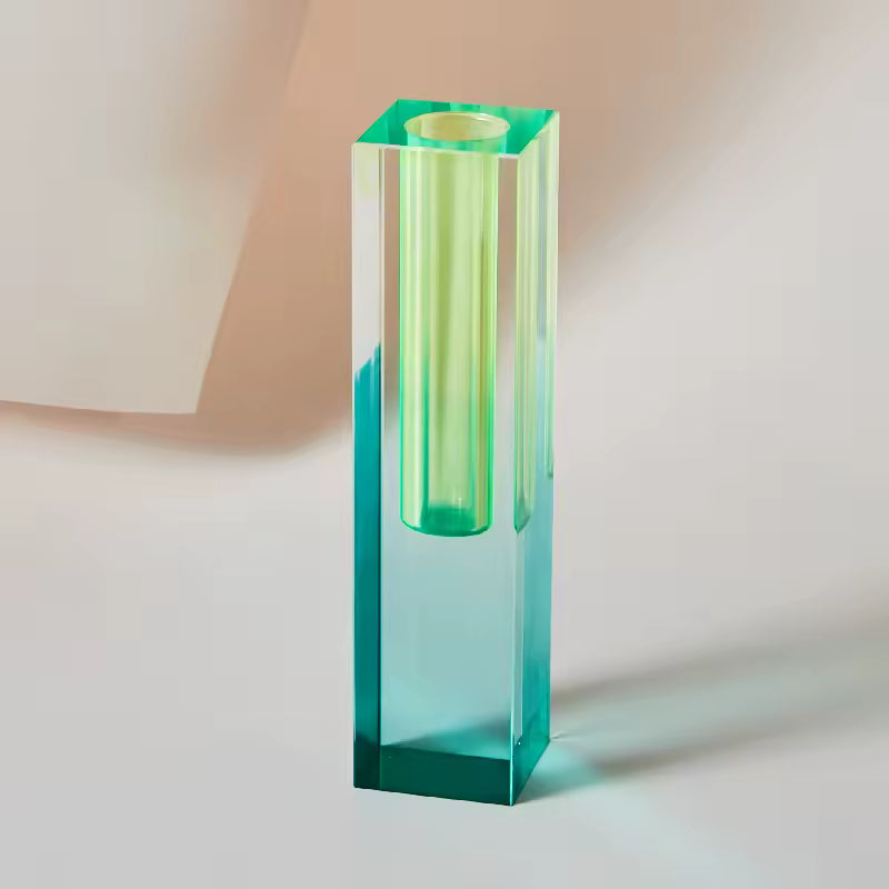 Gradient green glass vase on a light background
