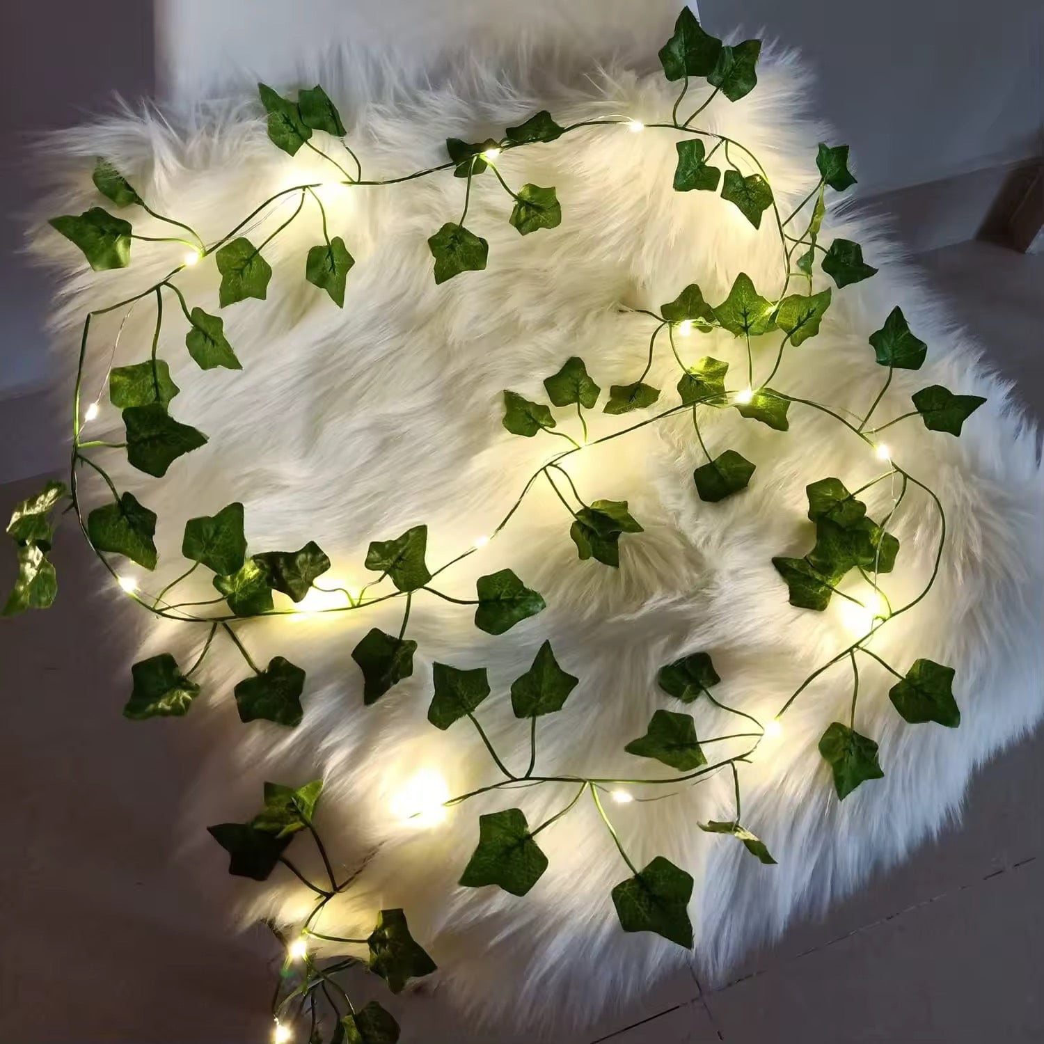 Vertical view of 2-meter LED floral light garland creating dreamy wall decor.