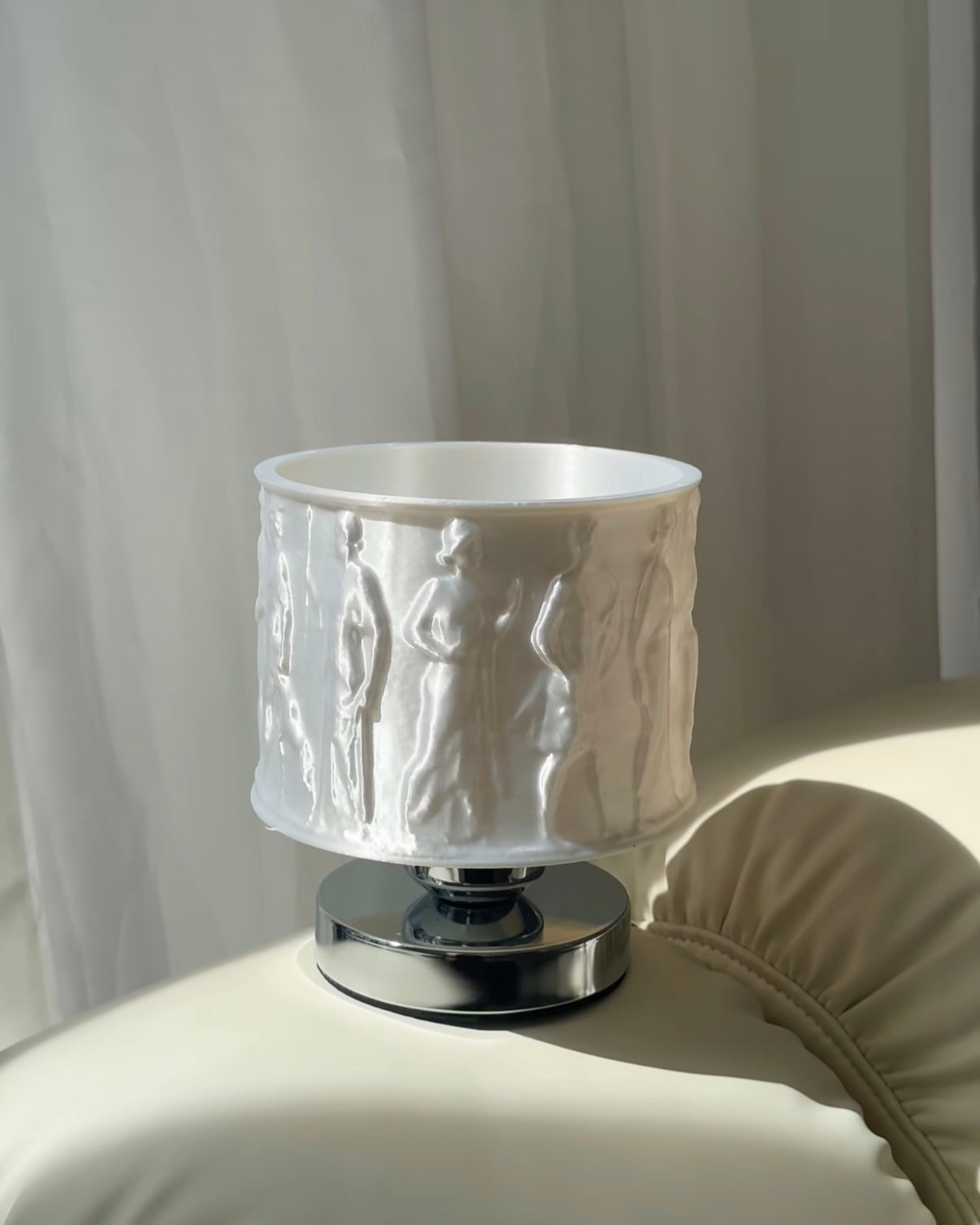 Relief art bedside lamp designed for reading with gentle ambient light and decorative style
