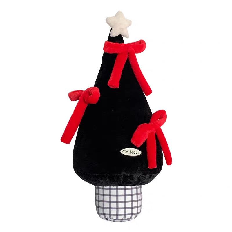 Black Christmas tree pillow with red plush bows and gray checked base