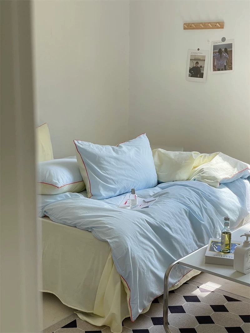 Small bedroom with a bed and a nightstand.