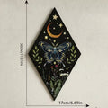 Witchy bedroom decor with butterfly and moon elements