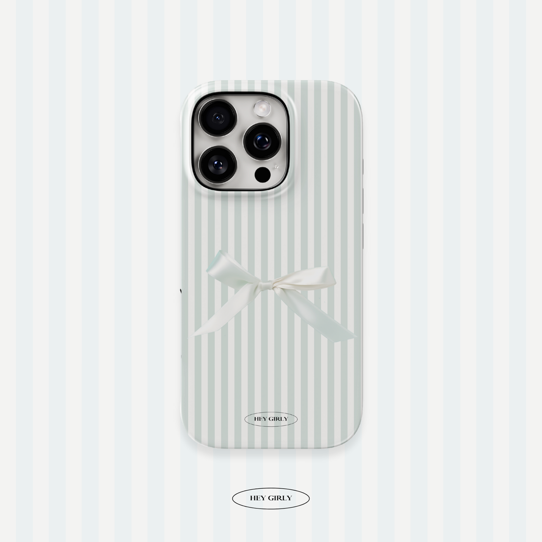 Phone case with white stripes and a bow on a light blue background