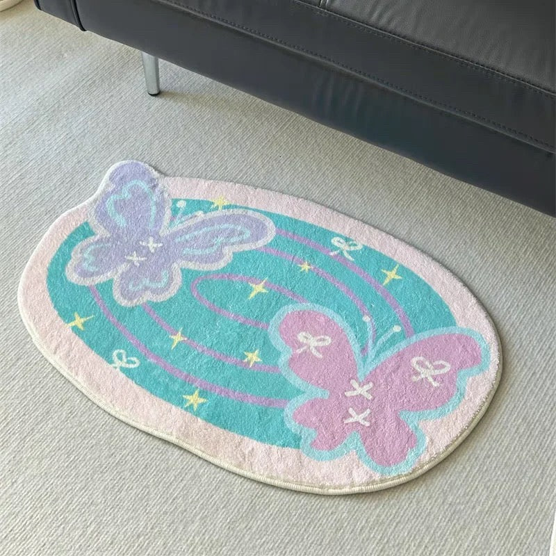 Pastel butterfly bath mat with aqua center, lavender butterfly, pink butterfly and yellow stars