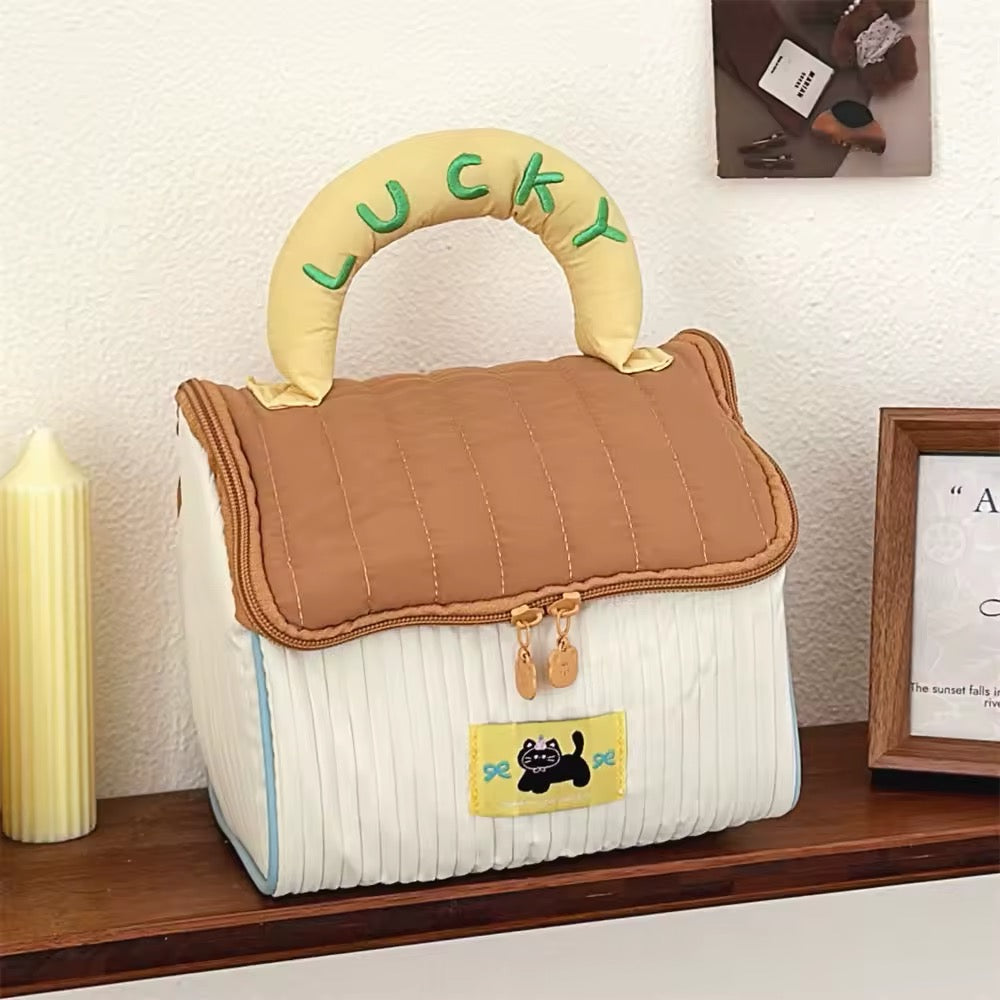 Cute cosmetic bag with cottage design and practical storage layout, aesthetic gift idea for birthdays or holidays
