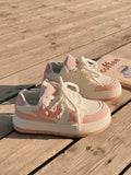 Women’s Y2K pink sneakers with star pattern