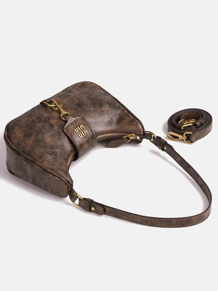 Chic Y2K crescent shoulder bag for women. Niche retro Maillard crossbody bag perfect for spicy girl and streetwear aesthetics.