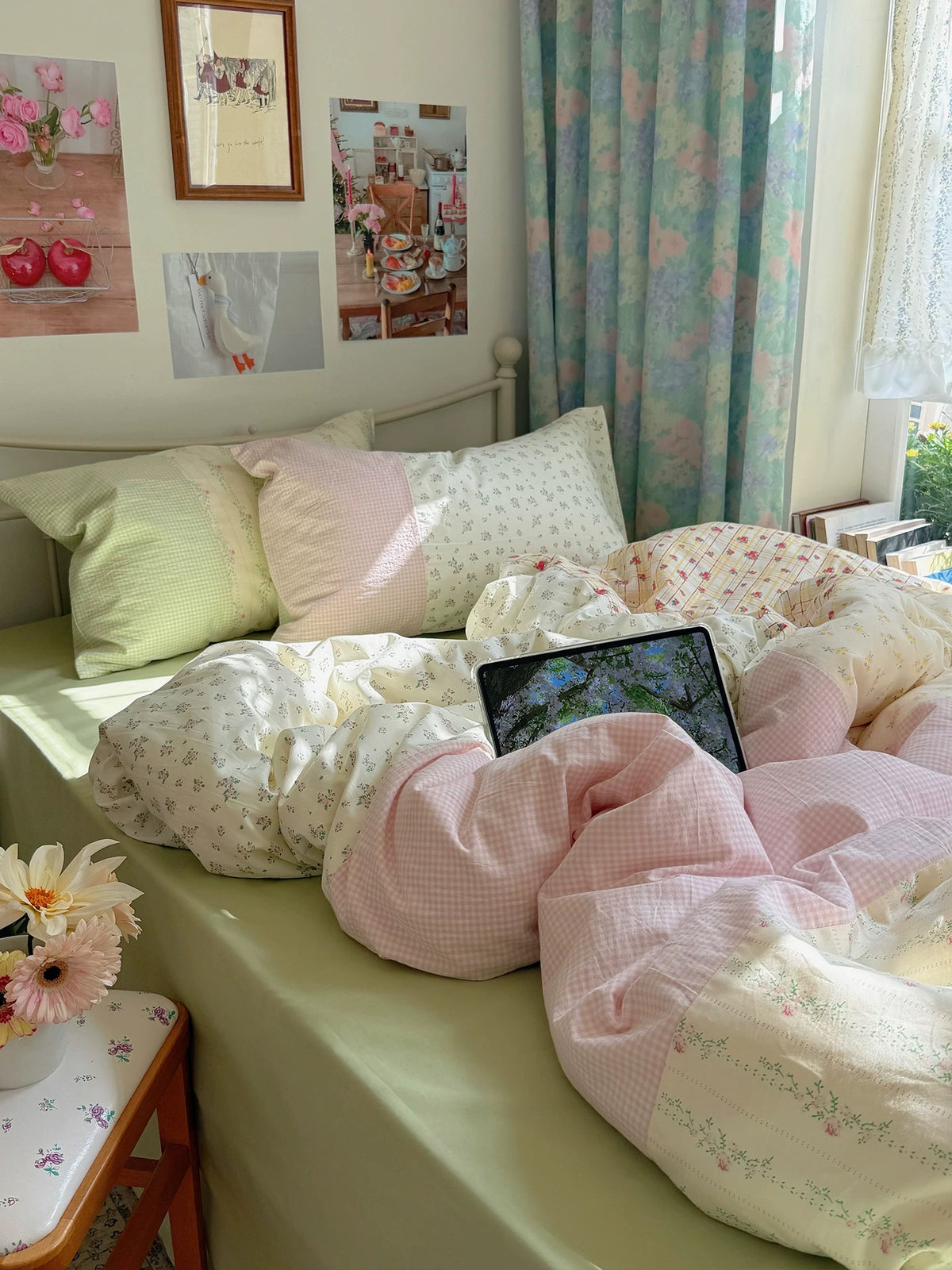 Cottagecore floral bedding with pink gingham and green floral layers