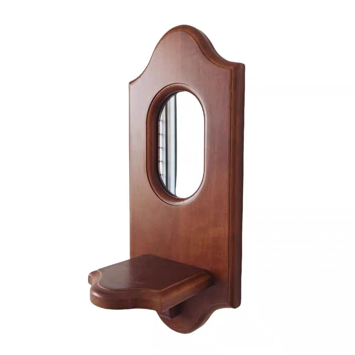 Solid rubber wood wall mirror styled above wicker baskets.
