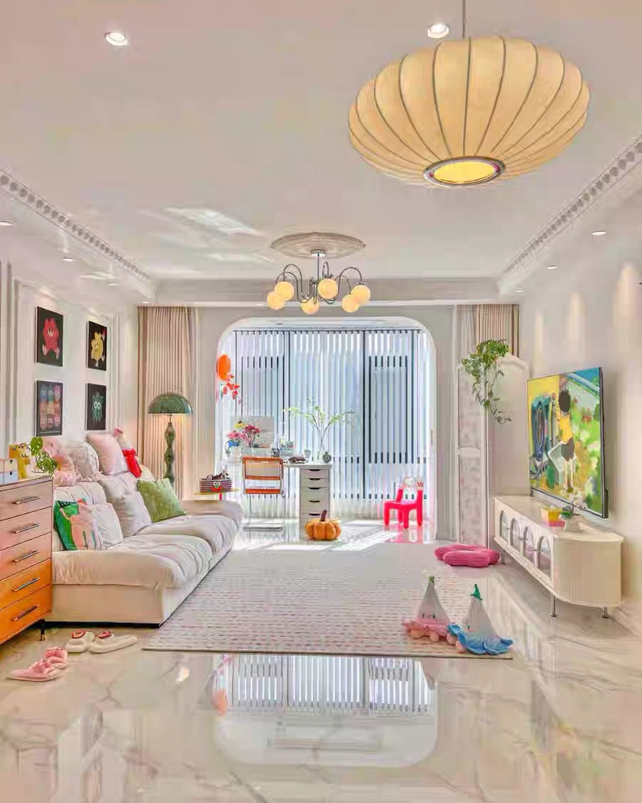 Children's playroom with toys and furniture on a patterned rug