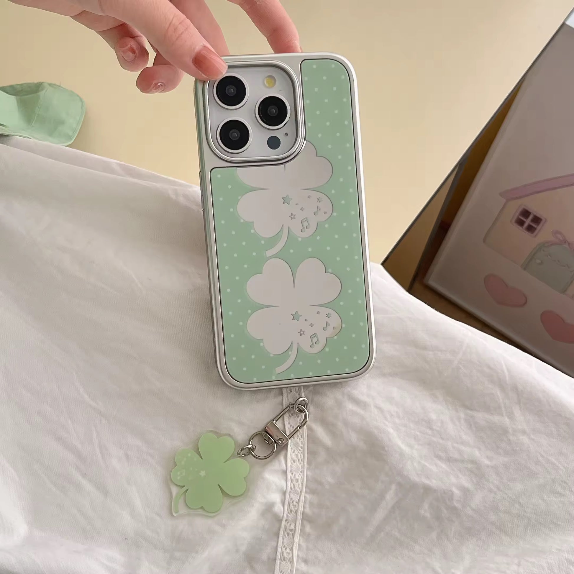 Minimalist polka dot iPhone case for college girls styled with neutral tones