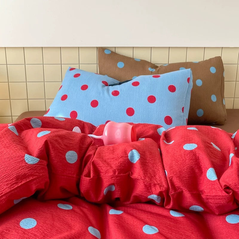 Cute polka dot duvet cover creating colorful preppy bedroom look for students cozy youthful decor
