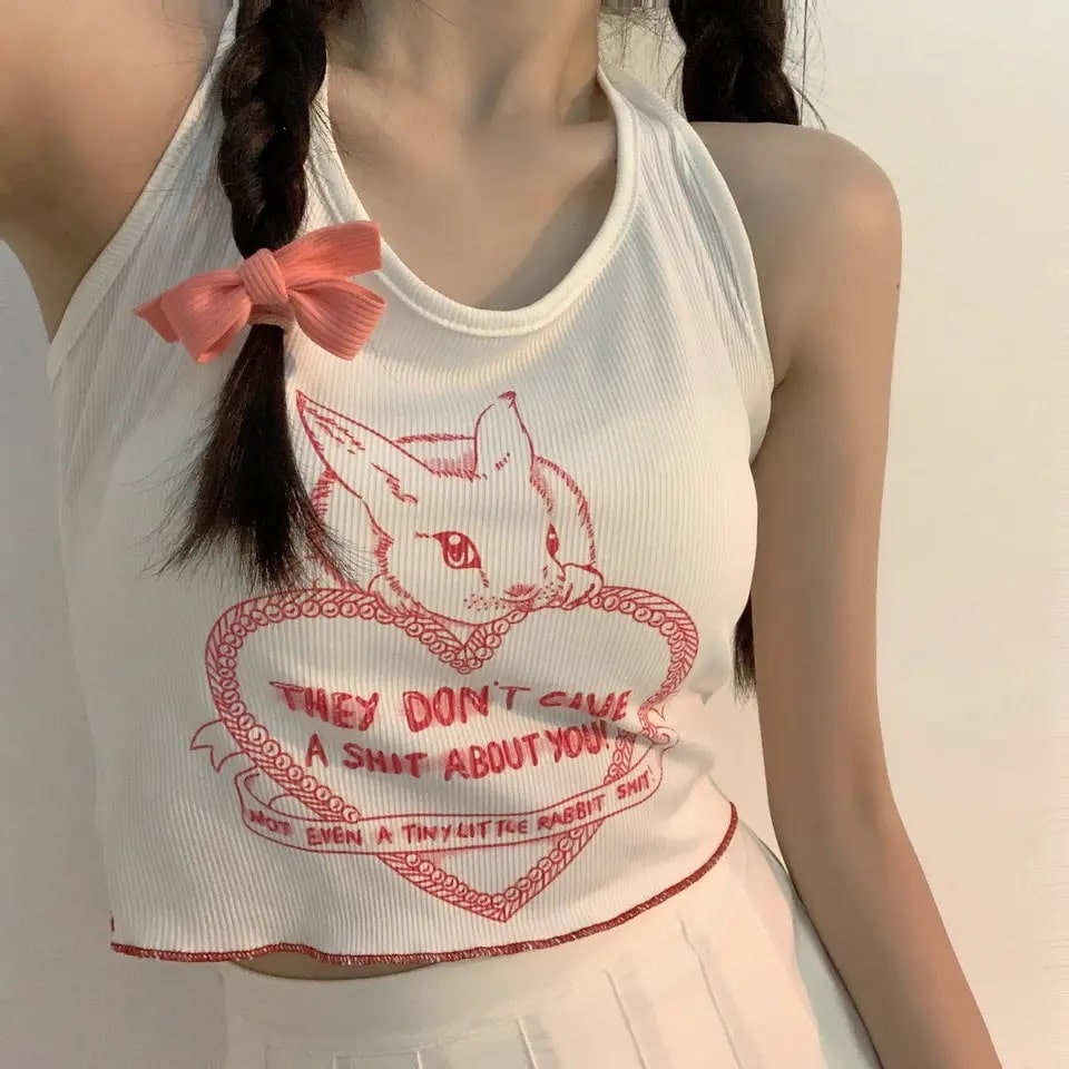 Y2K Korean halter top with sweet heart print and bandage drawstring design. Cute V-neck summer crop top for retro streetwear looks.