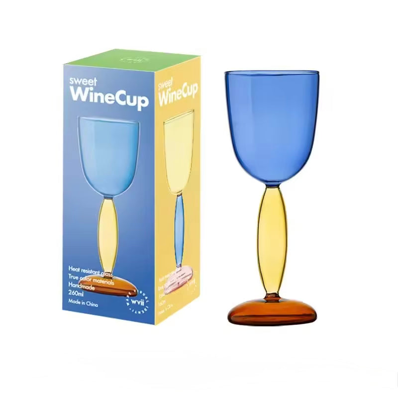 Colorful wine glass with a matching box on a white background