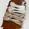 Beige caviar spoon for luxurious table settings