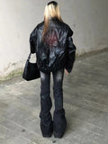Printed flared jeans ideal for retro streetwear and high street fashion trends