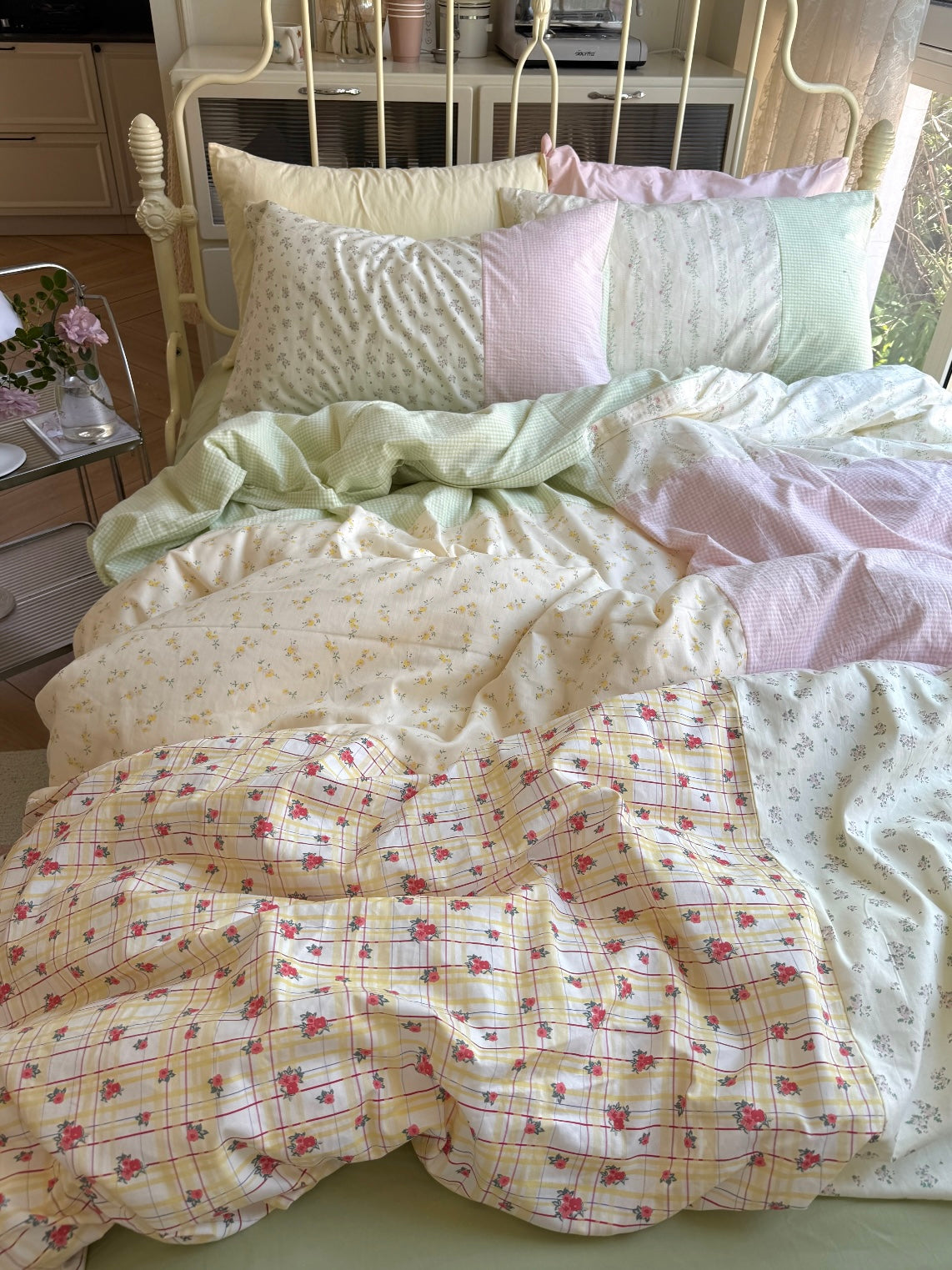 Green floral duvet cover styled with pink gingham patchwork