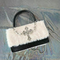 Black square gothic handbag with plush leather finish. Y2K grunge crossbody bag for subculture-inspired fashion looks.