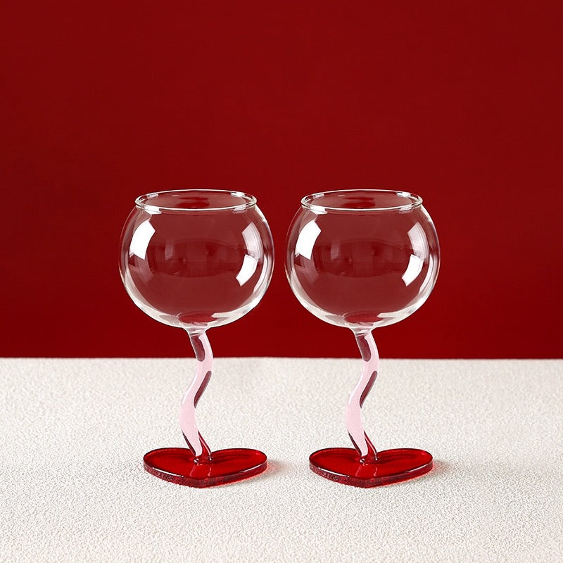 Heart shaped wine glass with red heart base and pink twisted stem romantic aesthetic decor
