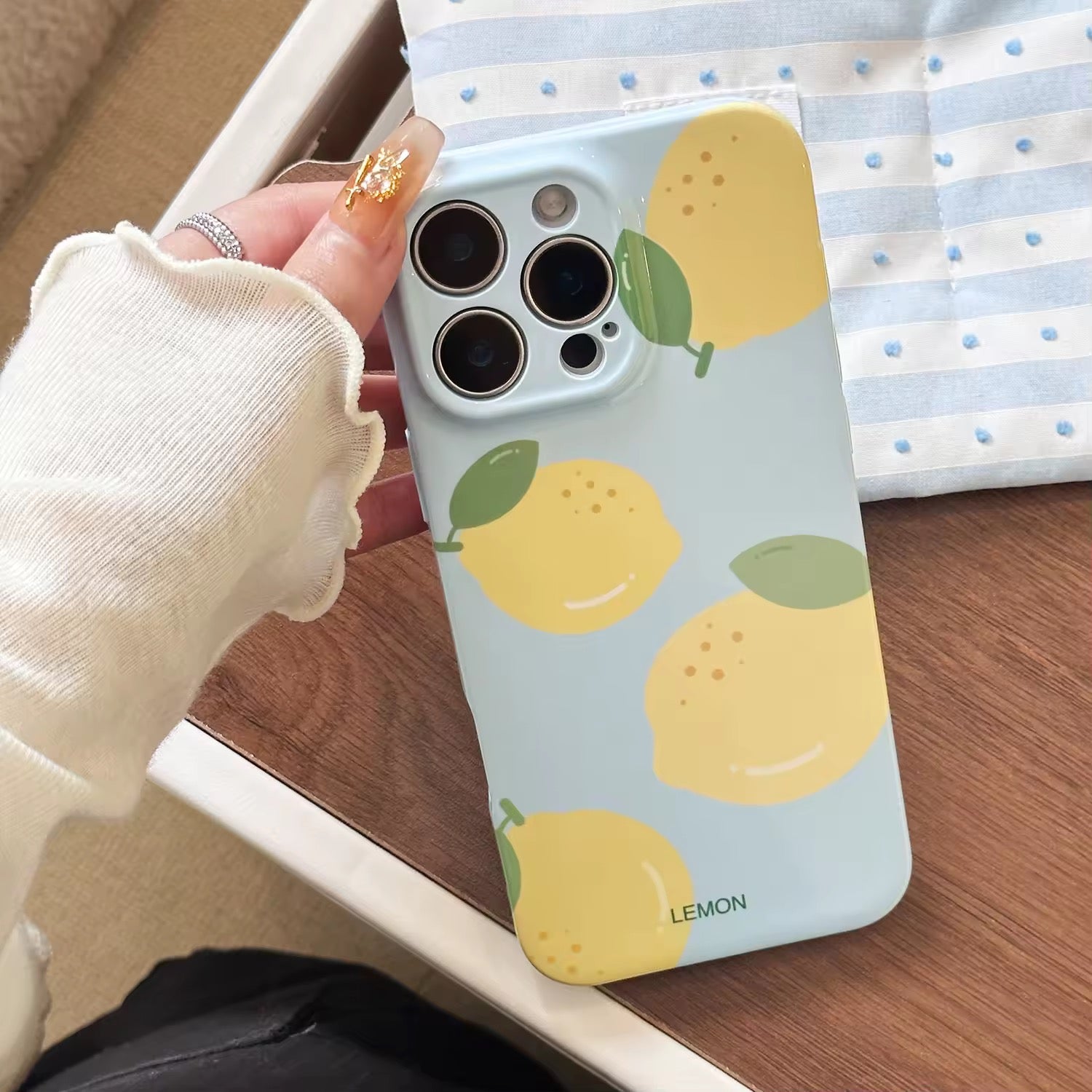 Aesthetic iPhone 16 case with juicy yellow lemon print