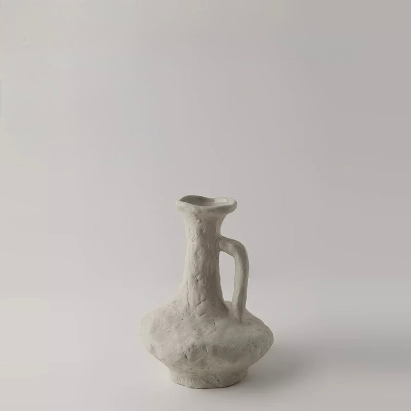 Gray ceramic vase on a light gray background