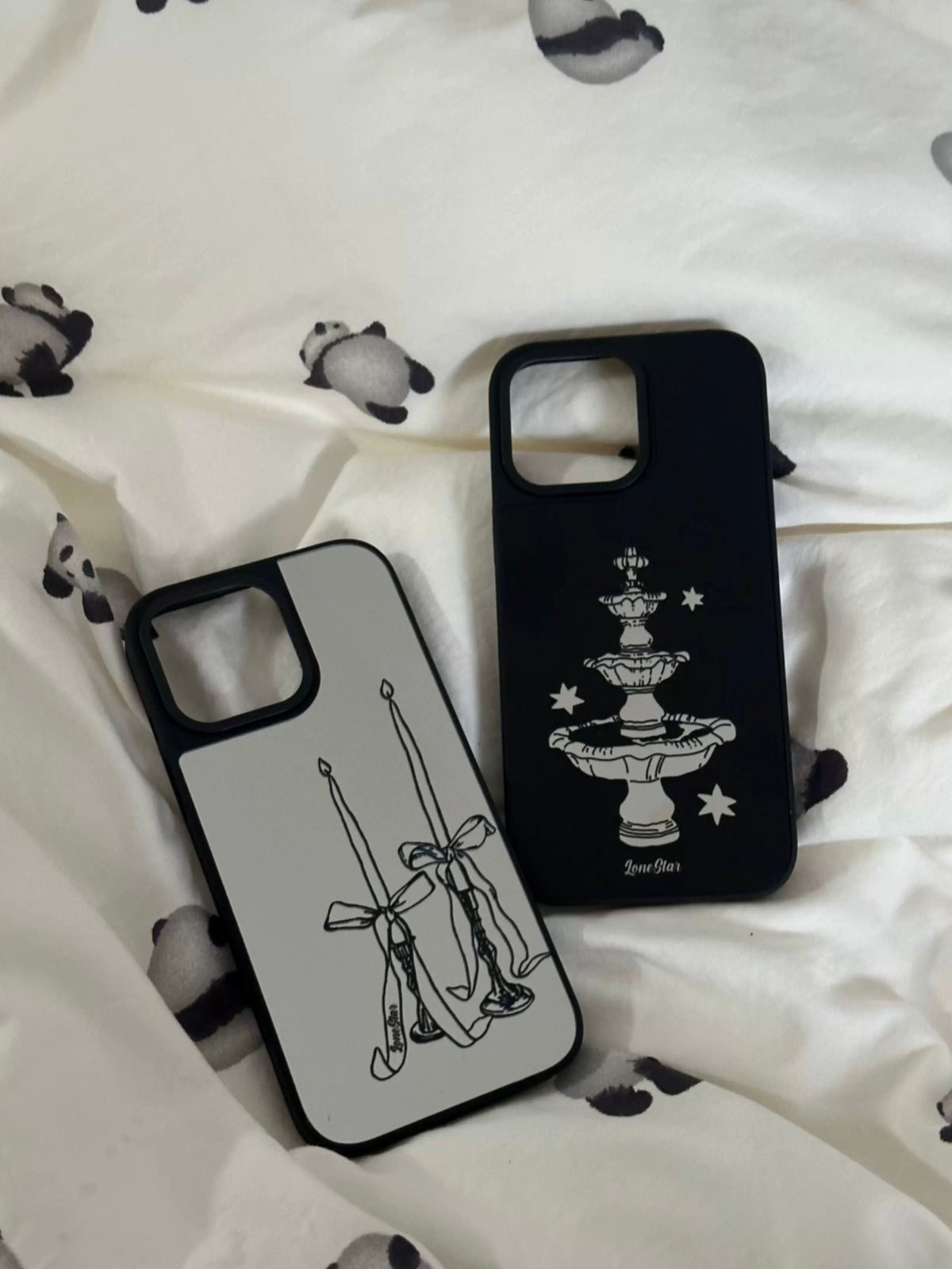 Silver and black mirror phone case designs shown together, with candle bows and a tiered fountain.