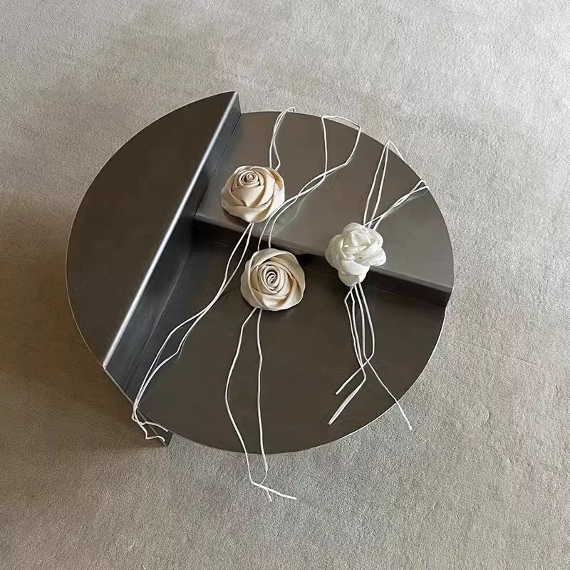 Minimalist metal coffee table creating gallery inspired interior with balanced geometric form and practical tabletop surface daily.