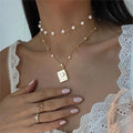 Stainless steel soulmate necklace with openable locket. Elegant heart and moon pendant design for romantic gifts.