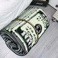 Close-up of the shaggy polyester rug shaped like a bundle of dollar bills
