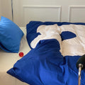 Modern soft room featuring cotton floral comforter