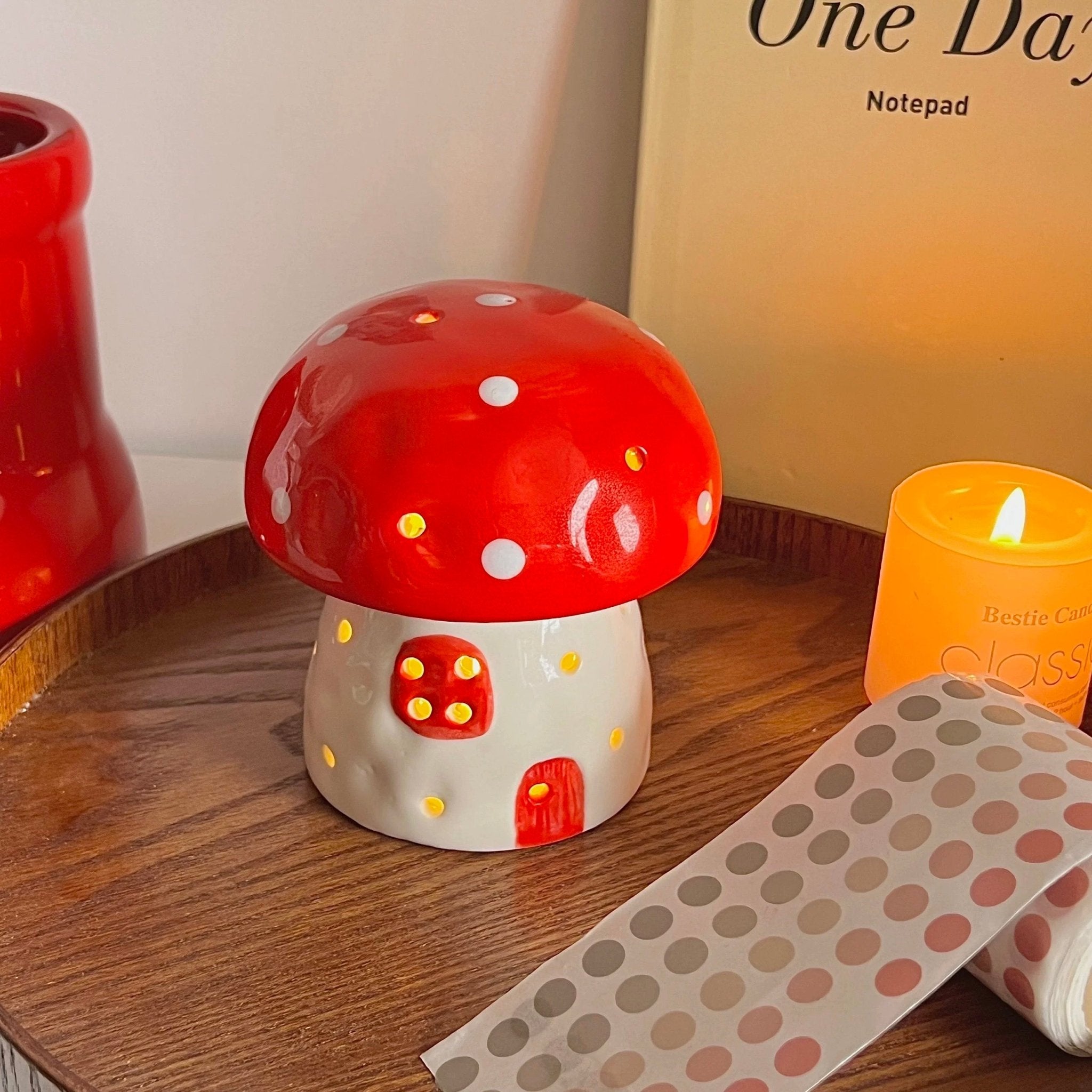 Child’s reading nook lit by pastel pink mushroom LED light