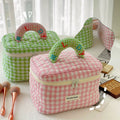 Large capacity travel toiletry bag in soft pastel plaid design for ladies