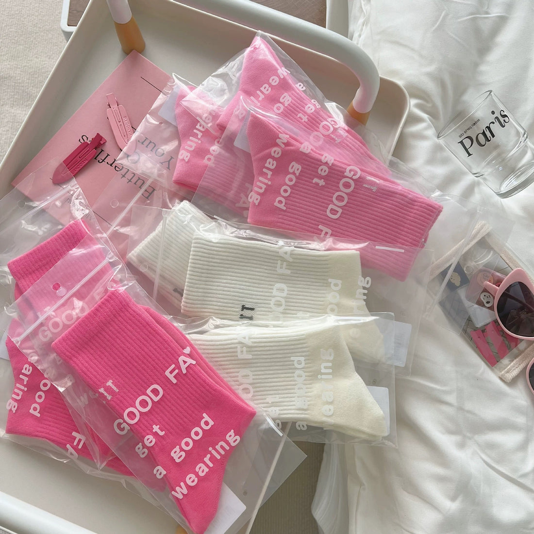 Y2K pink socks women mid-tube letter design cotton streetwear.