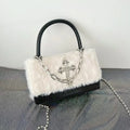Grunge-inspired Y2K handbag with plush leather and gothic cross design. Stylish crossbody bag for women’s hip hop fashion.