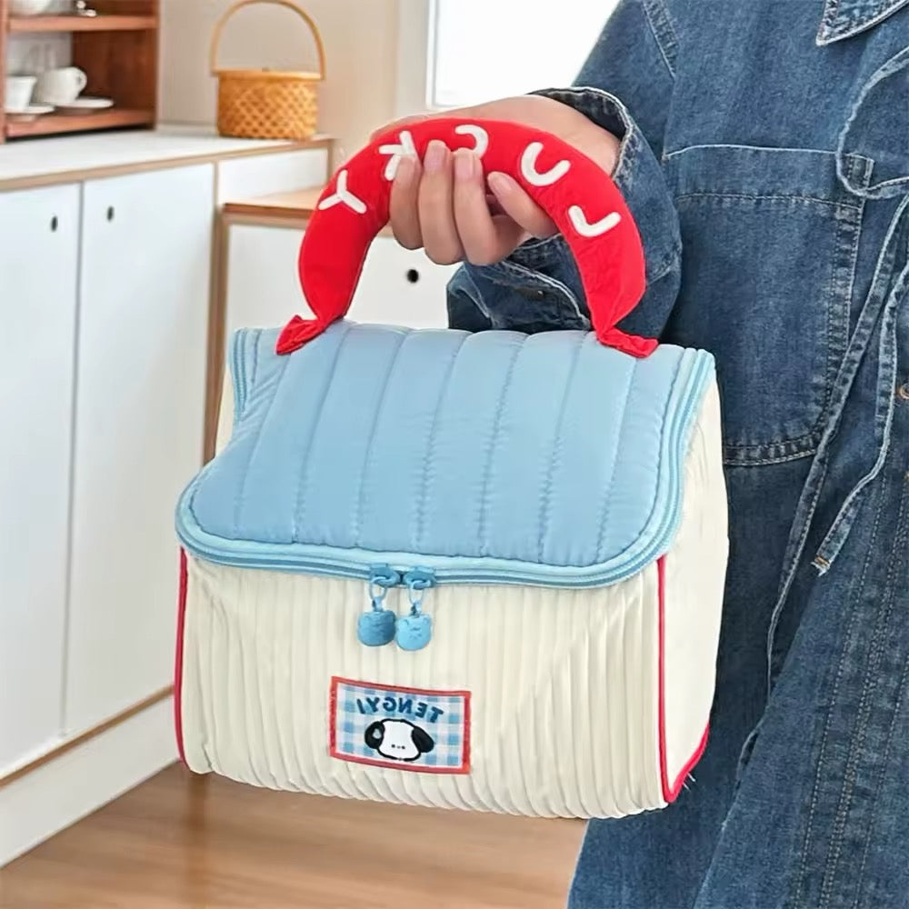 Charming house-style toiletry pouch in pastel design, great for makeup, skincare, or kids’ gift bags