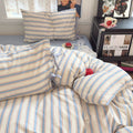 Aesthetic room with retro lamp and striped pillowcases