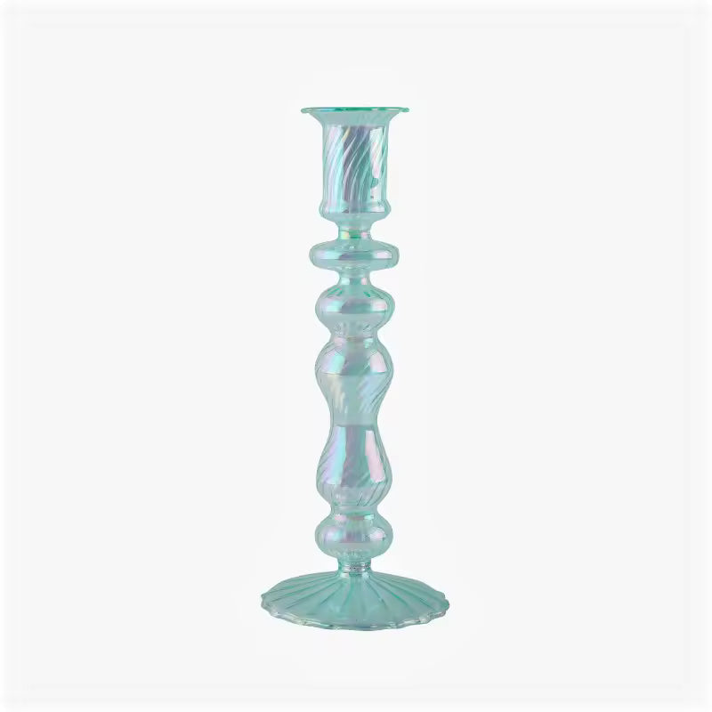 Iridescent glass candle holder on a white background