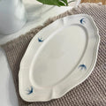 Retro ceramic dessert plate with bird design