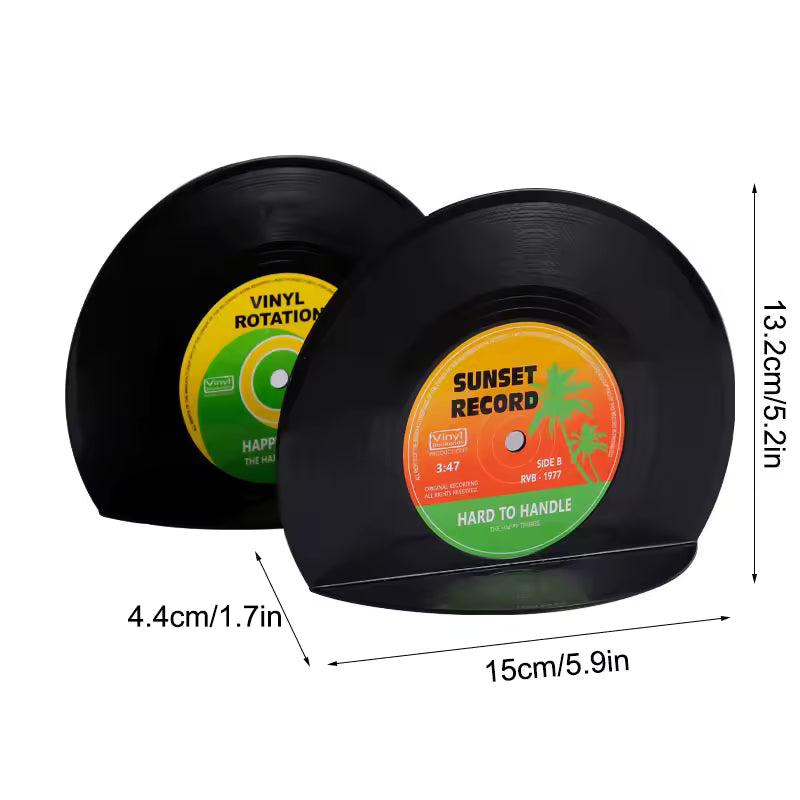 Two vinyl records with colorful labels and dimensions on a white background