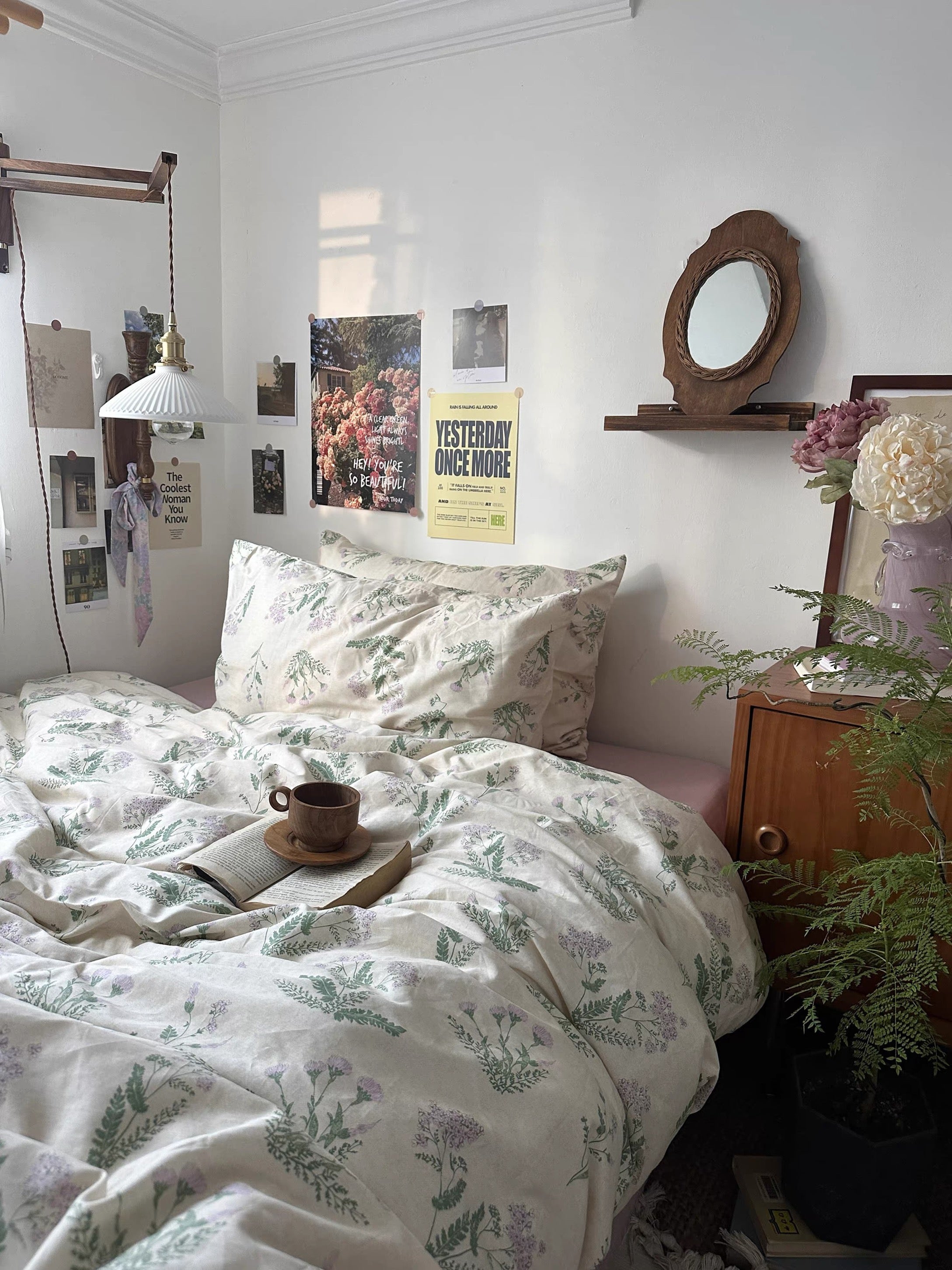 Romantic floral bedding featuring botanical illustrations creating timeless cottage inspired interior with breathable cotton comfort.