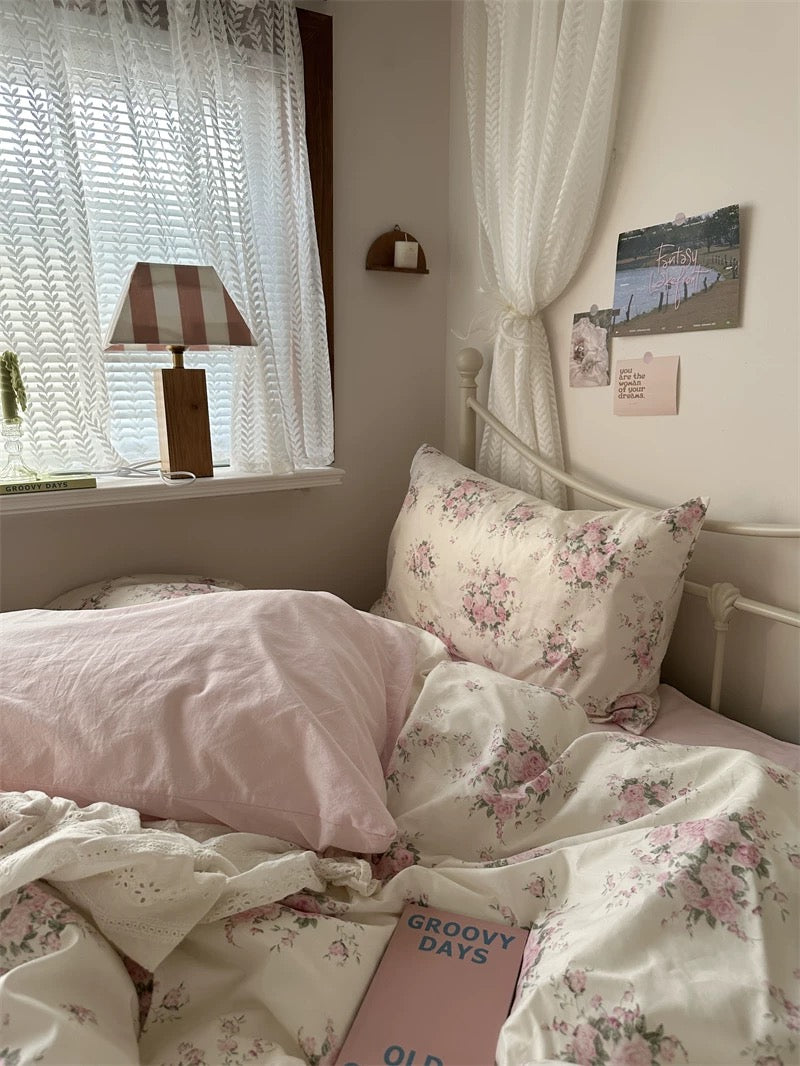 Soft cotton floral duvet cover featuring delicate rose pattern for cozy English cottage inspired sleep space styling.