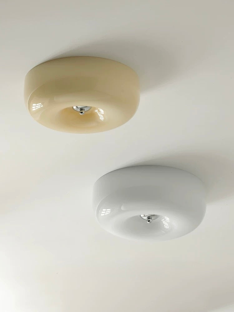 Two ceiling lights on a white ceiling
