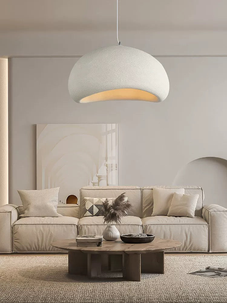 Japandi style light hanging in textured interior
