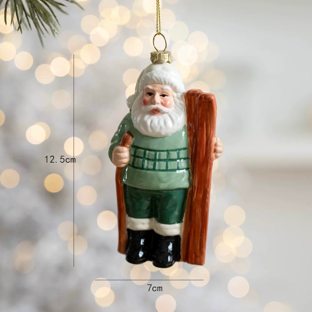 A skiing Santa ornament wears a green checked sweater and holds brown skis beside black boots.