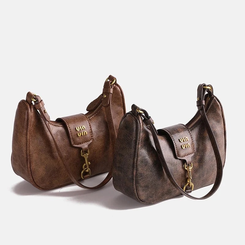Small PU leather vintage bag for women. Coffee color crescent-shaped underarm bag with Y2K-inspired design for casual fashion.