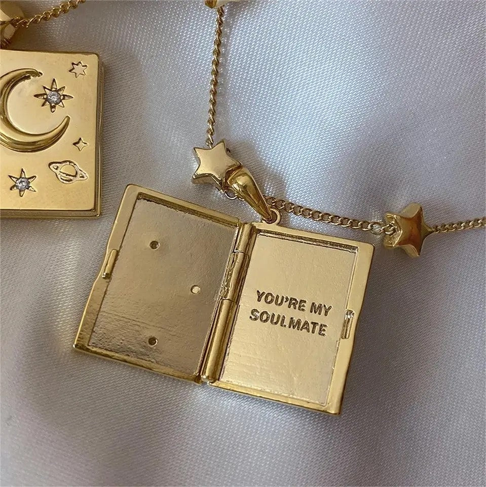 Moon, heart, and star locket necklace with "You're My Soulmate" lettering. Tarnish-free stainless steel jewelry for women and men.