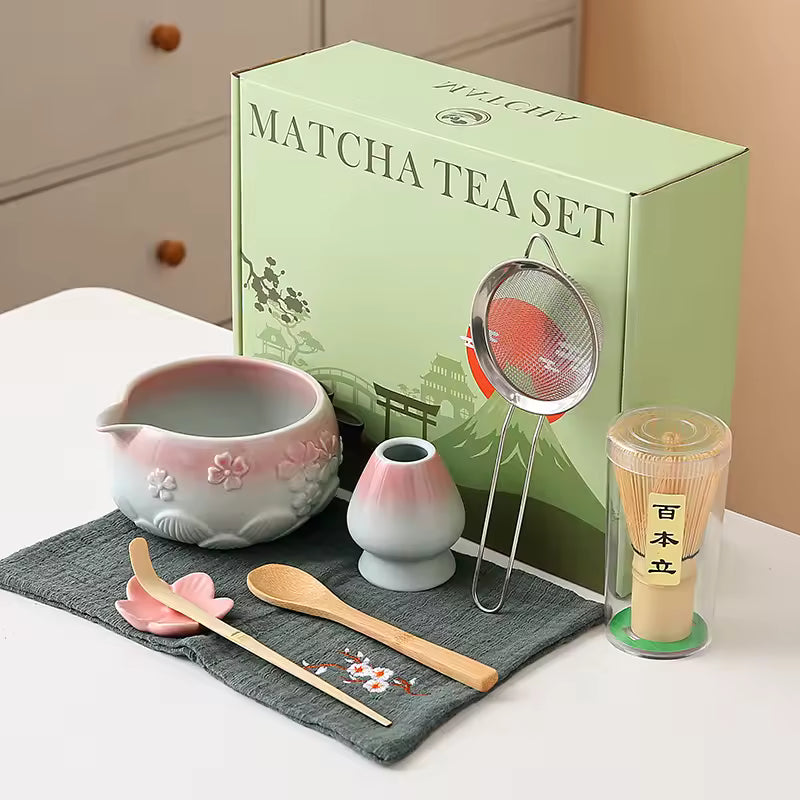 Matcha tea set with green box labeled 'Matcha Tea Set' on a white surface.