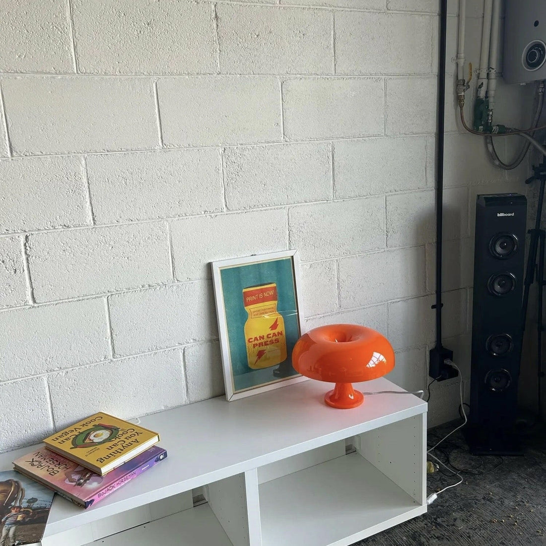 White mushroom table lamp with orange accents. Retro Bauhaus style for bedrooms and Nordic home decor. Perfect bedside or desk lighting.