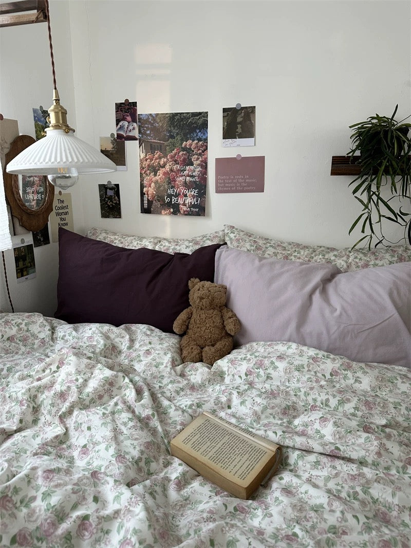 Breathable cotton duvet cover decorated with blush rose pattern for timeless English cottage inspired sleep space comfort.
